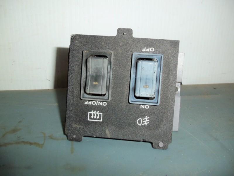 Rear window defrost & fog lamp switch panel 1984-1996 jeep cherokee xj