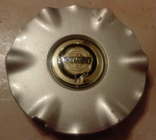 One oem 2001-03 chrysler sebring wheel center cap hubcap (silver)  0sr21trmac