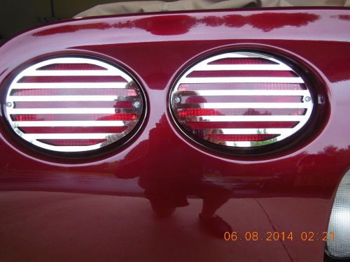 Polished stainless steel tail light covers corvette c5