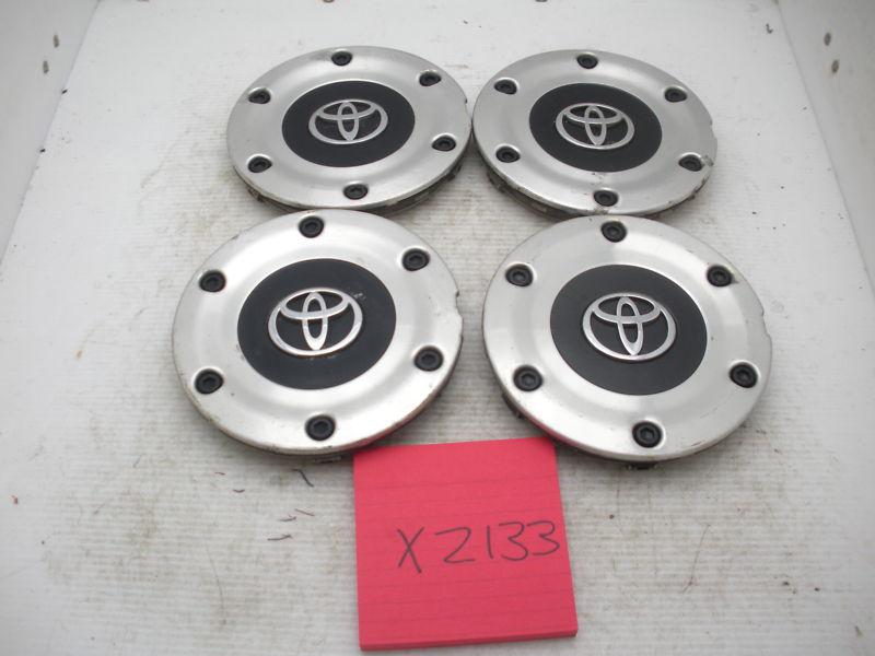 Lot of 4 oem 99-03 toyota solara 42603-aa050 wheel center caps hubcaps