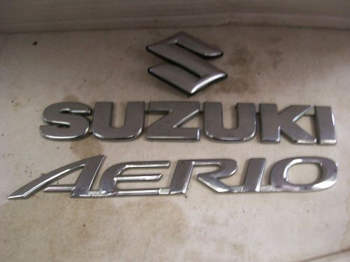 Suzuki aerio chrome trunk script ornament emblem