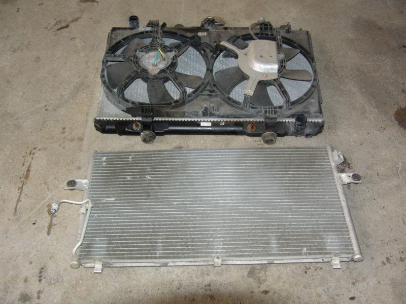  nissan  maxima  2000 -2003 radiator  with fans and condensor