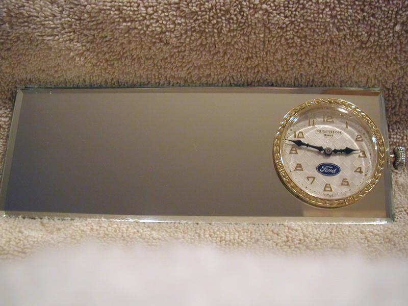 1928 1932 1933 sandoz ford mirror clock / stainless steel bracket 1934 1935 1936