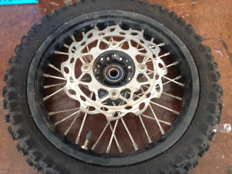After market front wheel 12 mm axle honda awesome!