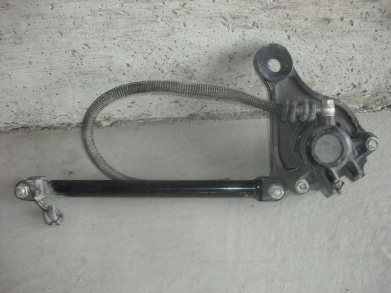 Rear brake caliper with pads and stabilizer linkage
