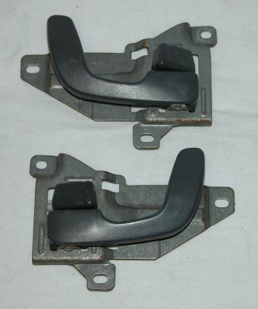 95-99 mitsubishi eclipse talon factory gray inner door handles  nice pair