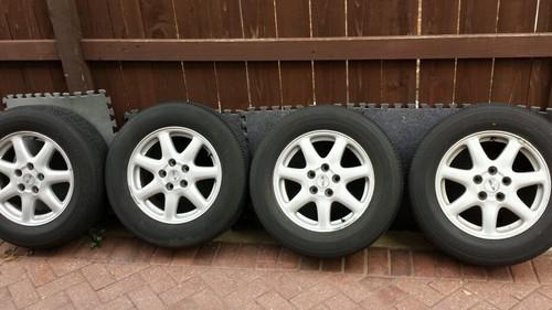 Complete set cadillac seville oem rims and tires sls