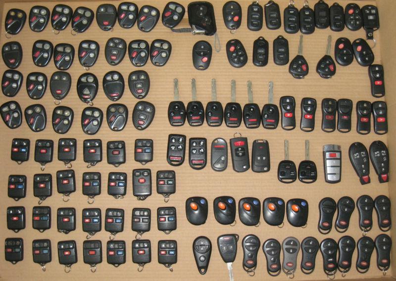 Lot of 114 keyless entry remote / fob gm lexus ford nissan honda chrysler mazda 