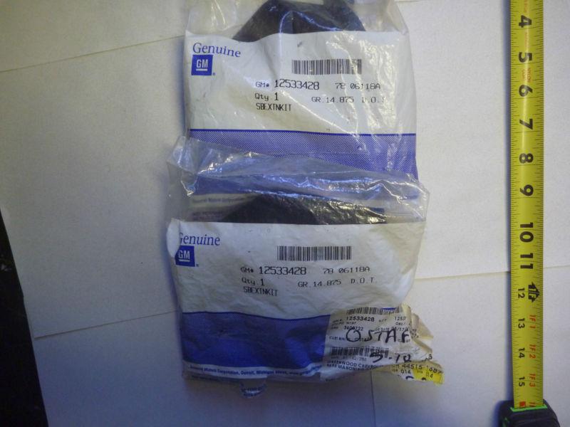2 a pair of factory sealed seatbelt extensions extenders for gm part # 12533428 