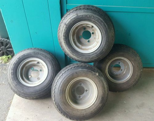 Set of four kenda hole-n-1 18 x 8.50-8 standard golf cart wheels and tires
