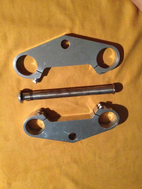 Motorcycle front fork triple clamps