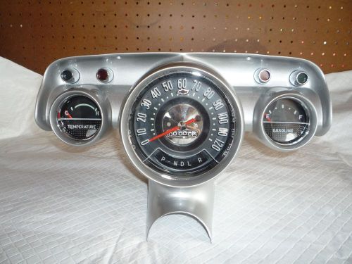 57 chevrolet instrument cluster w/ speedometer &amp; gauges  ( restored )