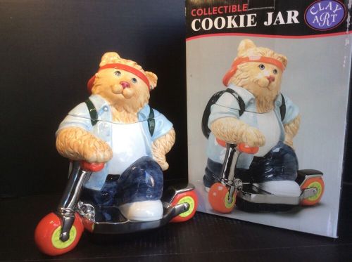 A cool cat on a chrome scooter cookie jar from clay art designs - new &amp; retired!