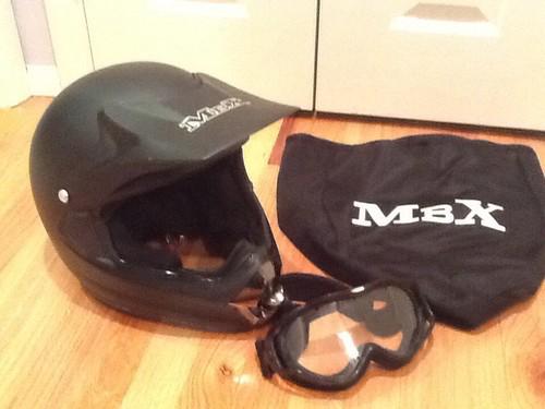 Mbx  motorcycle helmet size small. with storage bag and glx goggles