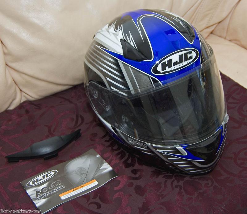 Hjc helmet axis ac-12. very clean..little use..no damage..beautiful blue/silver