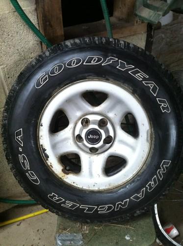Two jeep wrangler tires and rims 225/75r15