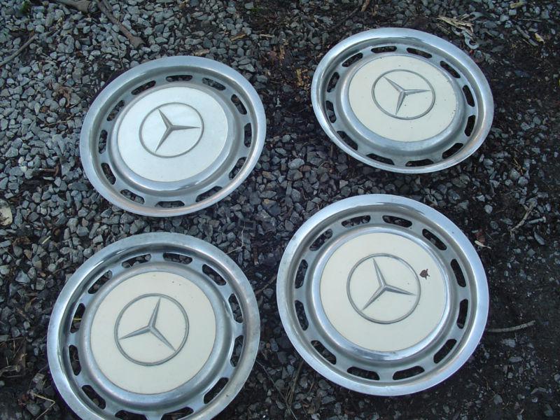 Late 1960 s mercedes -- benz  set of hubcaps 