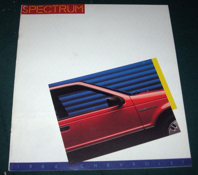 1986 chevy spectrum dealer sales brochure; sedan; hatchback coupe; 16 pgs