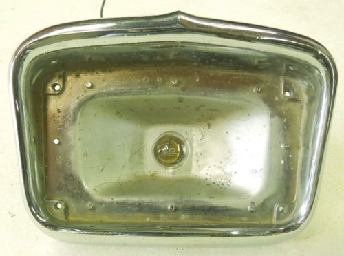 1956 chevy parking light bezel  item #1  cleaned buffed and shines