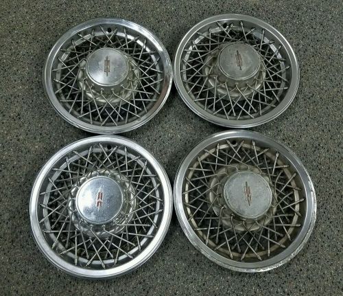 Set of 4 oem 1977-79 oldsmobile 88 98 cruiser wire spoked hubcaps wheel covers