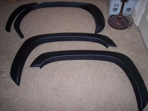 2000-2006 (only 3) chevrolet tahoe matte black fender flares smooth paintable
