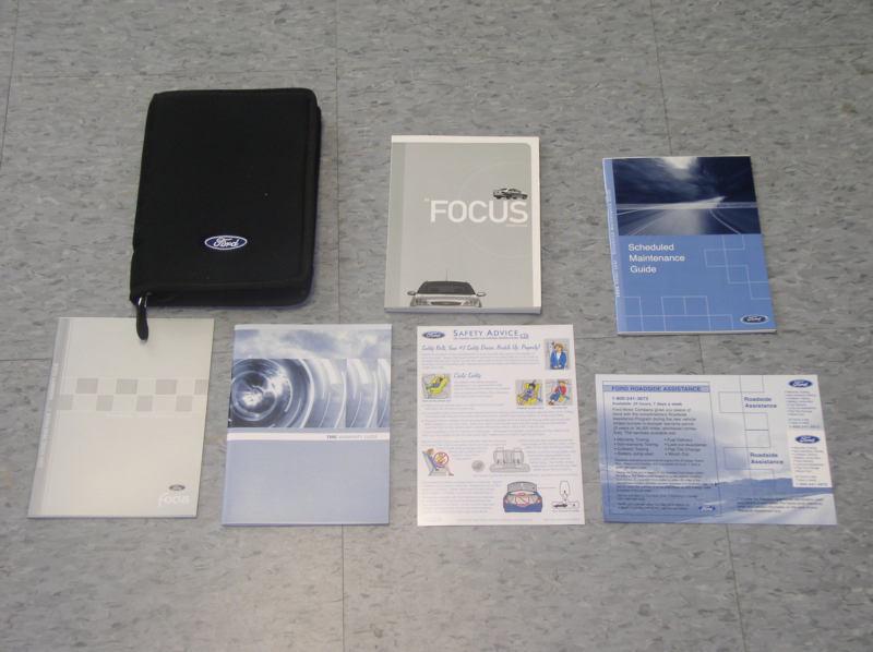 Ford focus owners manual and other owners paperwork in pouch