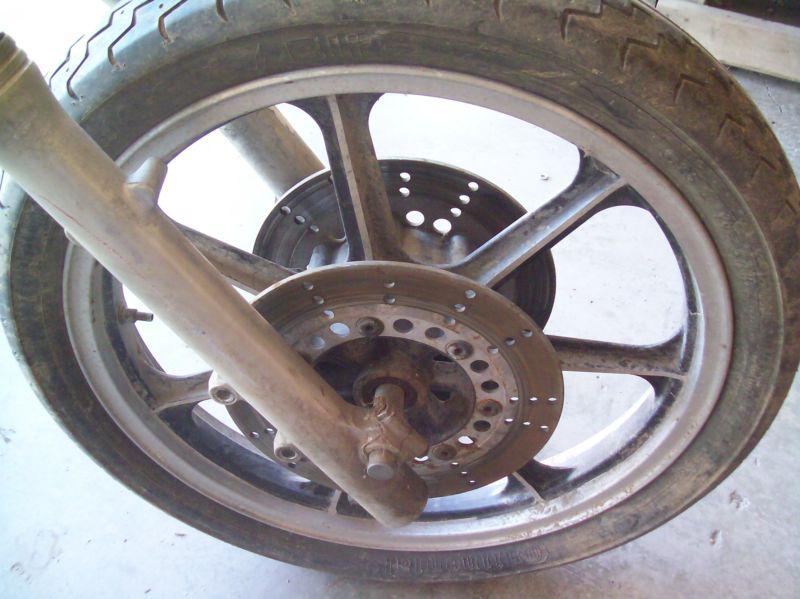 85-01 kawasaki vulcan 750 front wheel!!!!!!  (look free shipping)