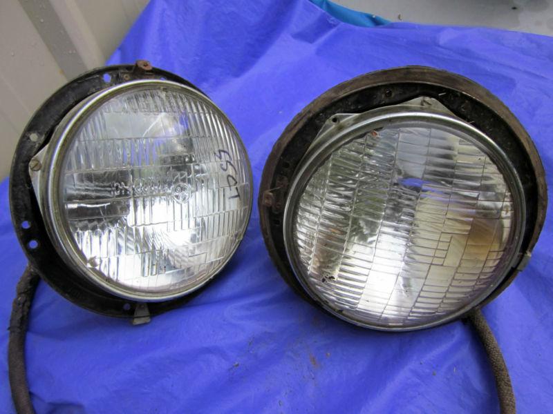 1955 1956 1957  chevrolet truck headlight buckets complete with wiring good pair