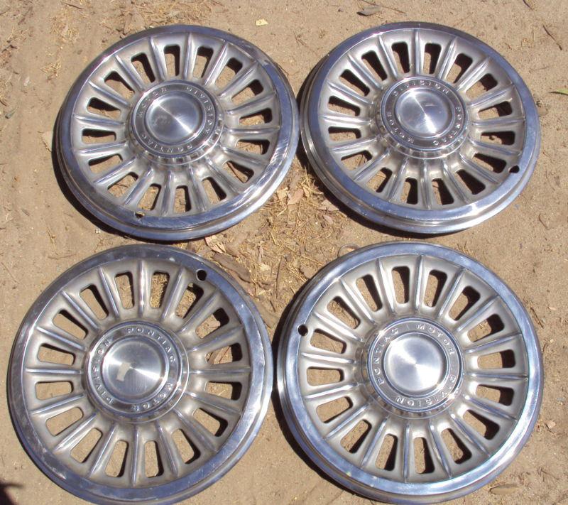 1965 pontiac set of 4 hub caps