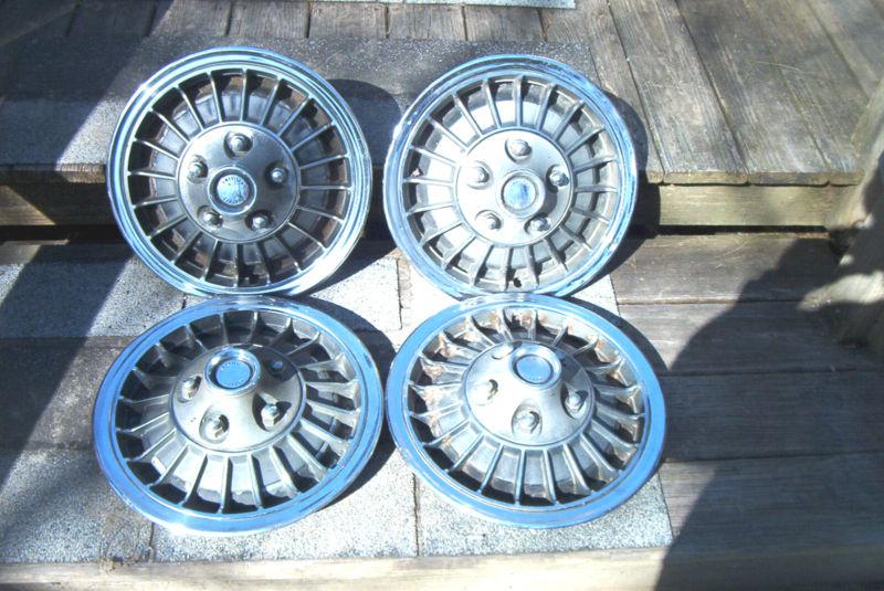 Oe set of four amc turbocast wheelcovers, # 101, 68-69 amx, other amcs 66-71