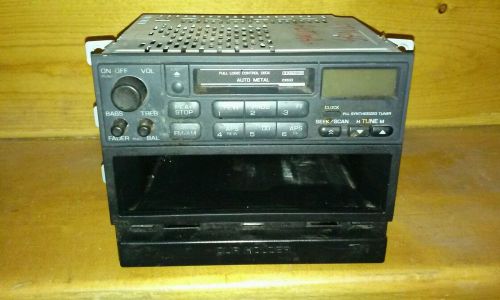 Nissan altima am/fm cassette radio  w/cupholder  1997