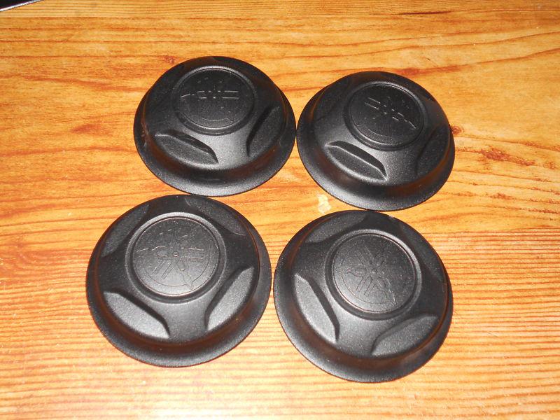 X 4, yamaha grizzly 660 front, rear plastic wheel center hub cap, axle nut cover
