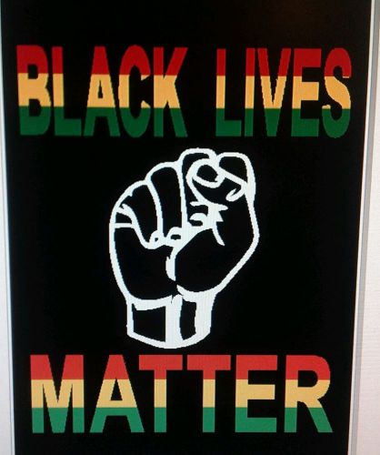 A large &#034;black lives matter&#034; decal or sticker jamaica colors green yellow res