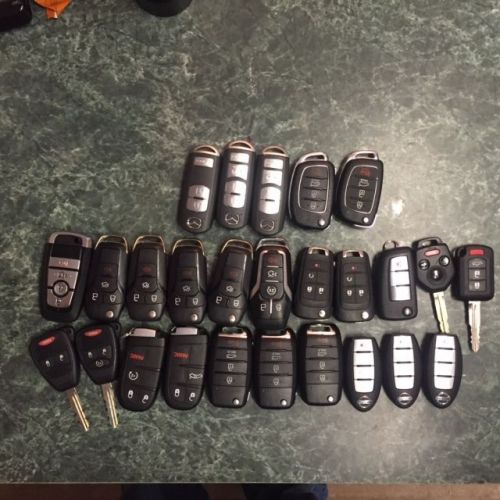 Dealer locksmith part lot 26 remote key fobs dodge kia nissan ford mazda oem