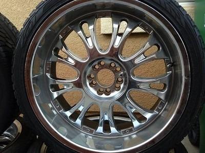 4 22 inch set of gazario chrome rims with tires (4 rims 4 tires)
