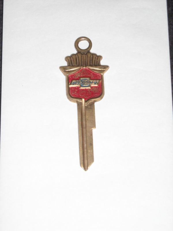 Vintage draper chevrolet co. gold key blank