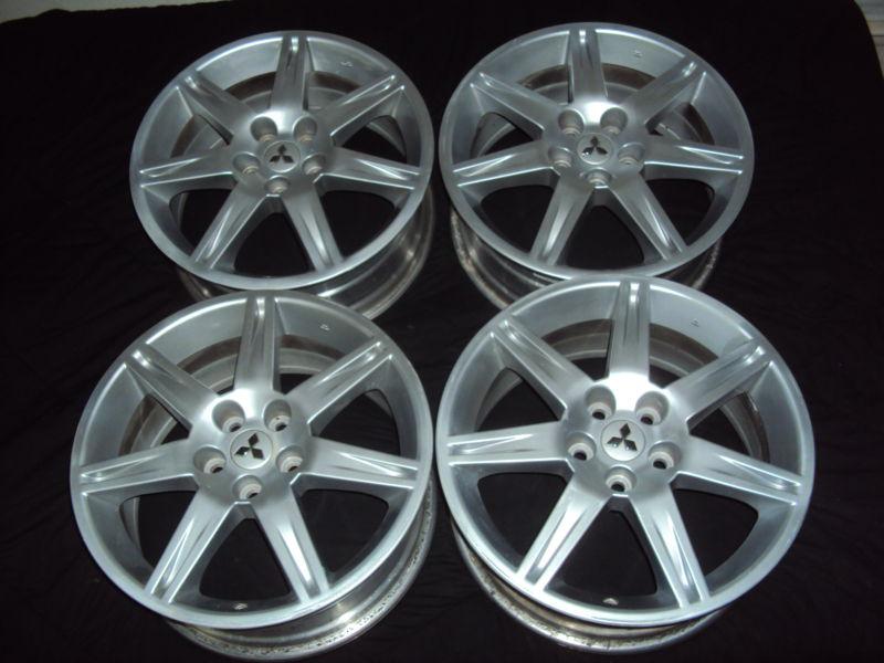 Set (4) 18 " oem mitsubishi eclipse galant  wheels rims 65810 one w/slight dent