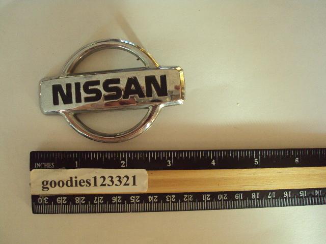 Nissan chrome emblem used 3 1/4" x 2 1/4"