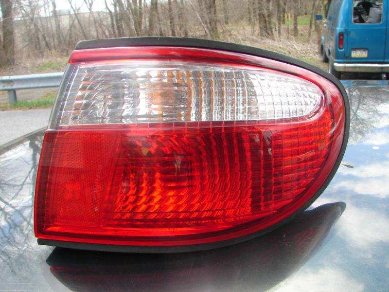 1999 00 millenia tail light outer cnr or qtr mounted rh