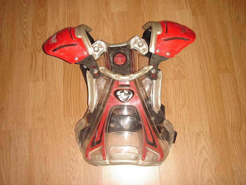 Thor motocross adult small moto chect protector. clear/red