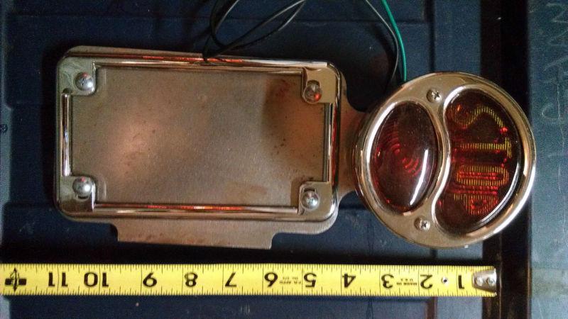 License plate frame c/w brake light. old school. weld on for customs or modified