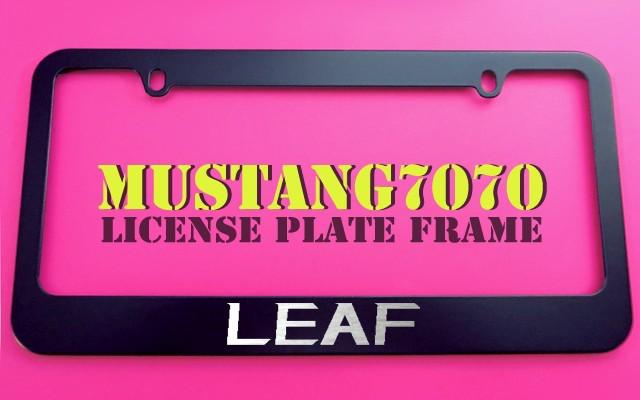 1 brand new nissan leaf black metal license plate frame + screw caps