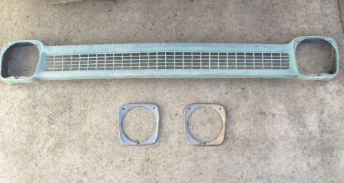 1964 - 1966 chevrolet truck grille and headlight bezel nice patina!