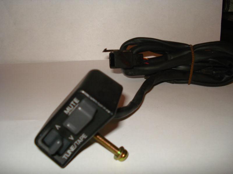 Am/fm radio control switch (left handlebar side)