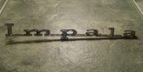 1967 chevrolet impala quarter panel emblem 67