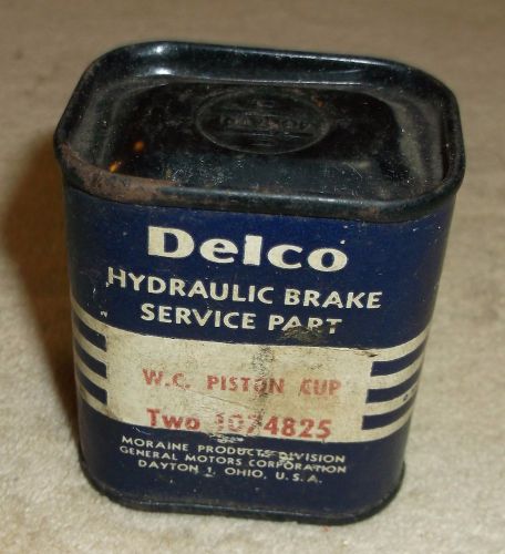 Nos delco hydraulic brake service part w.c. piston cup 1074825 - sealed tin