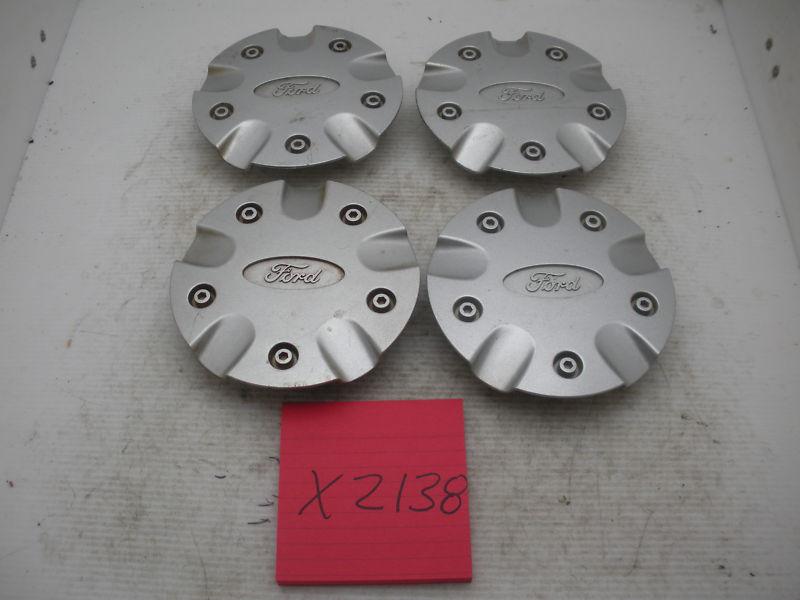 Set of 4 oem 00 01 02 03 04 ford focus wheel center caps hubcaps