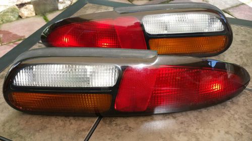 Set tail light covers - gm chevy camaro fits 1997 - 2002 models