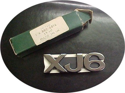 Jaguar,  new  xj6 rear mount emblem. chrome w/black backing.  perfect - nos