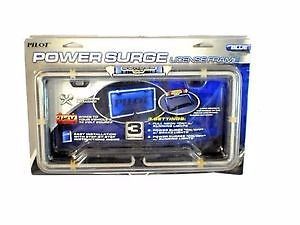 Power surge license plate frame